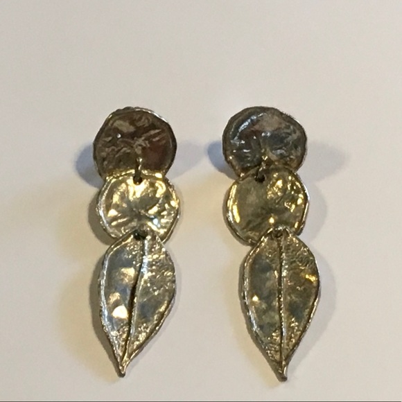 Sterling Silver circle and leafclip-on earrings. Created in 1975.